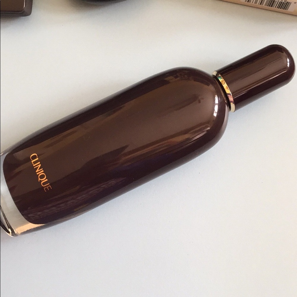 Clinique aromatics in black. Never used